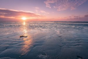 Zonsondergang op het strand op Terschelling - Midsland aan Zee