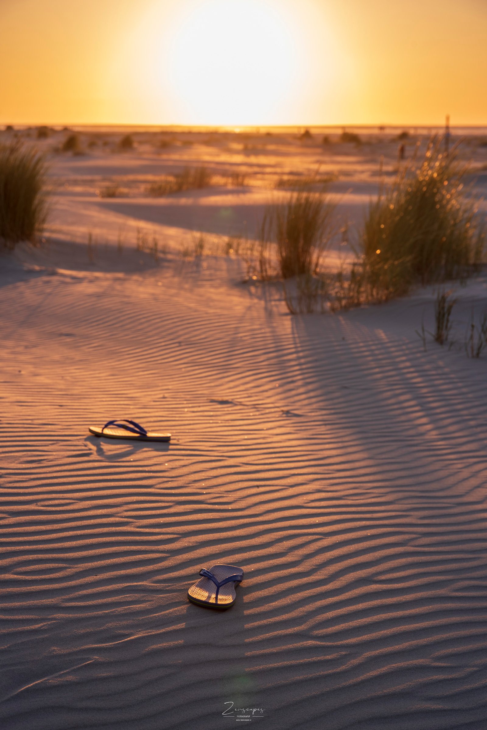 Slippers op het strand
